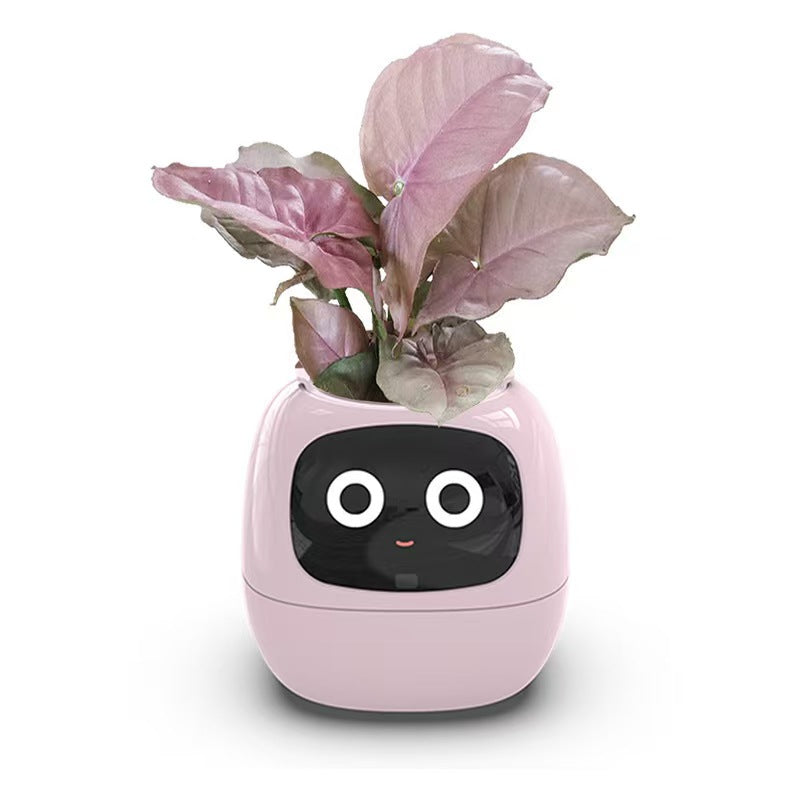 EMOKO smart pet planter robot in pink with animated face and purple leafy plant growing on top