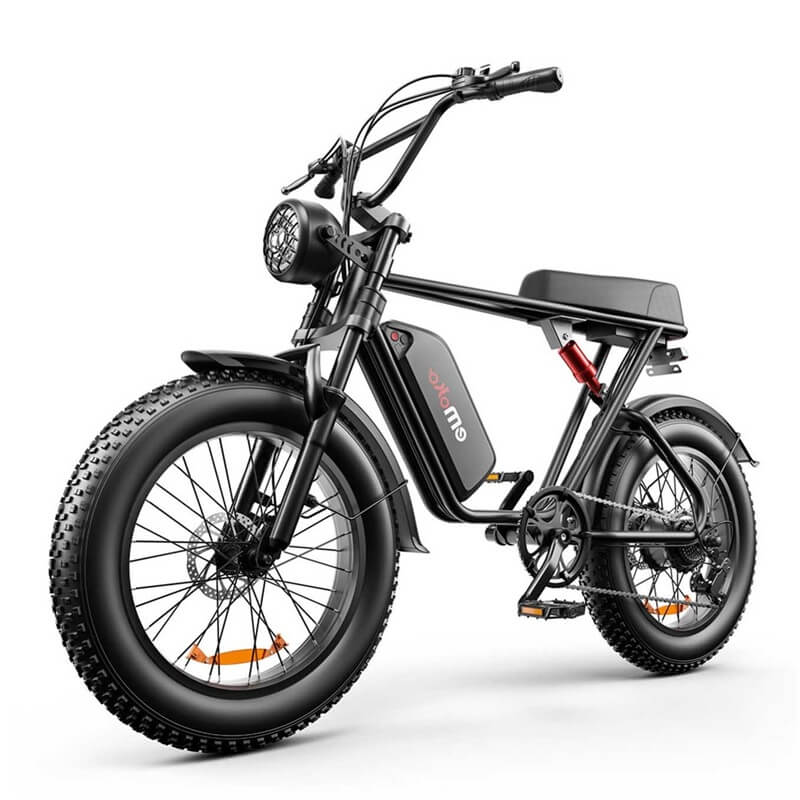 Emoko black powerful electric commuter bike with fat tires and front headlight for urban riding
